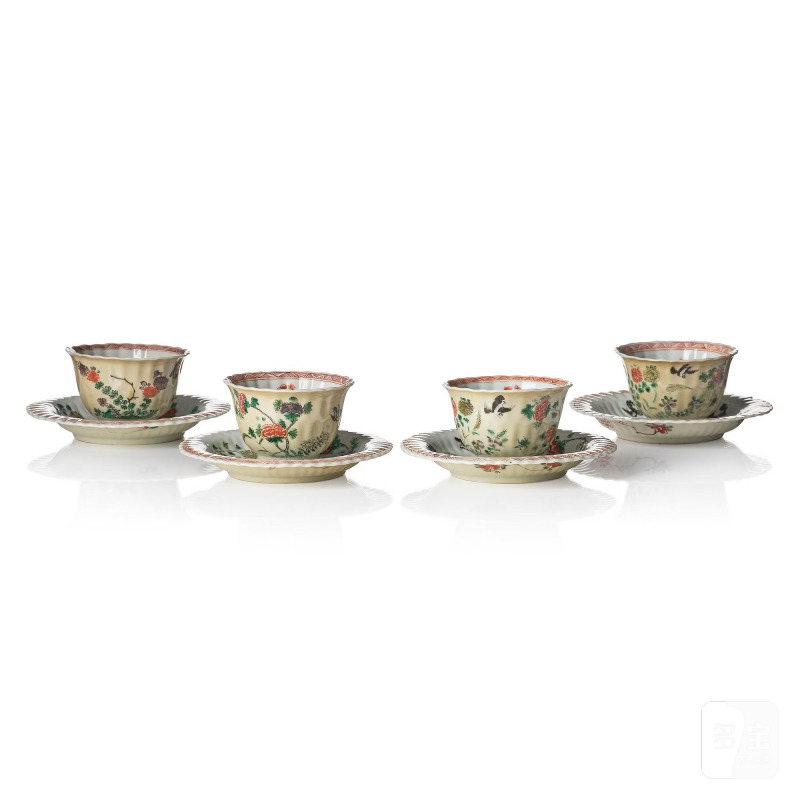 A set of four famille verte and cups with stands,